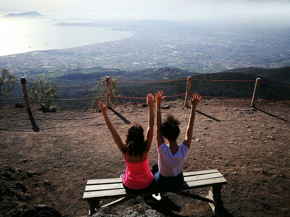 Two girl on the top of Mt. Vesuvius enjoying the view