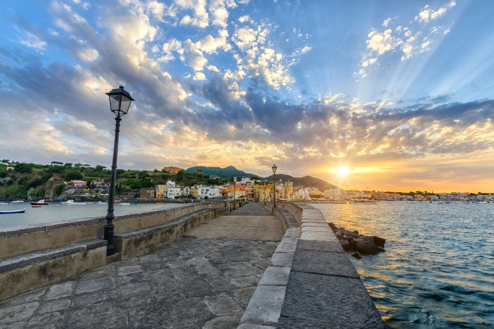 Evening cityscape of Ischia at sunset, town in the Metropolitan City of Naples, Italy